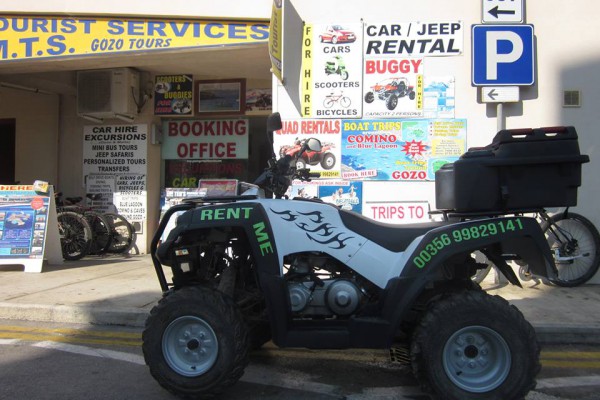 quad bike parked outside our office in Mgarr